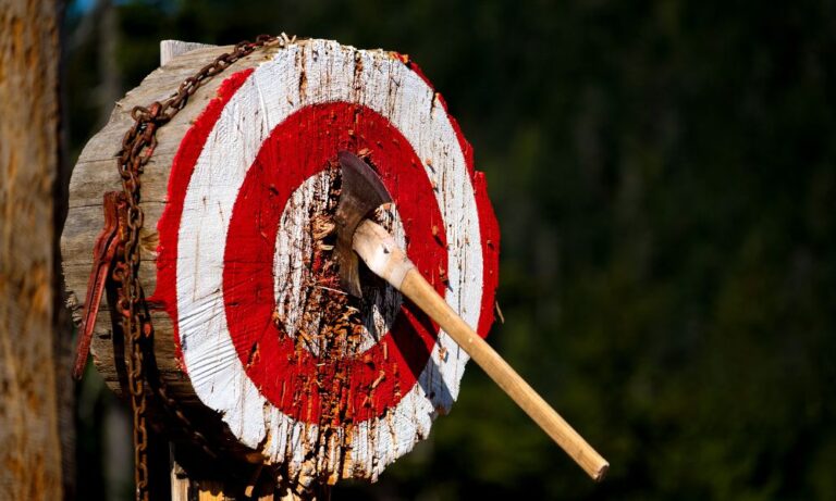 axe in wooden bullseye thrown to help improve low testosterone